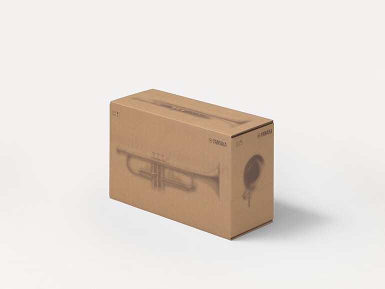 Yamaha cardboard shipping boxes with printed silhouettes of musical instruments.