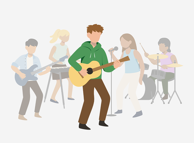 Mężczyzna, który z przyjemnością używa aplikacji Extrack, żeby jamować razem z innymi instrumentami