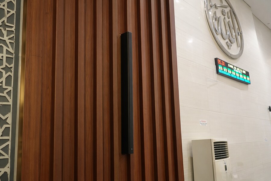 Close-up of the mosque interior with VXL1-24 slim line array speaker installed.